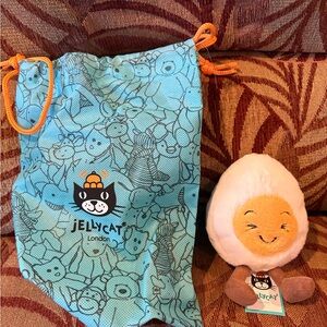 Jellycat Blue Bag with Smiling Plush Toy
